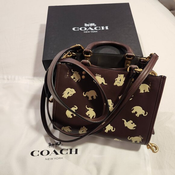 Coach Handbags - Coach Rogue Bag 25 With Elephant Print/Deep Chocolate Brown with Ivory Elephants
